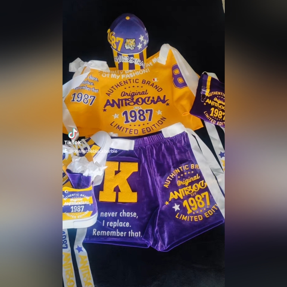 Purple & Yellow Outfit.Hat, Shirt, Shorts, Shoes, Purse SIZE: L-XL SHOE SIZE: 10